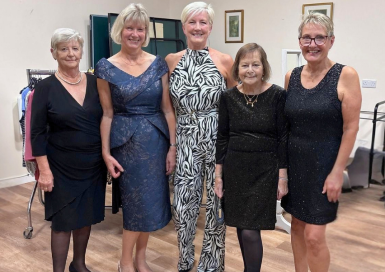 Caston WI modelling some New-U occasion wear at Fashion show