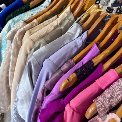 Row to occasion wear hanging on rail